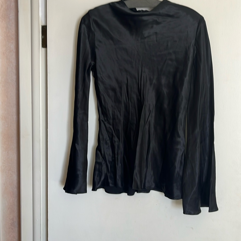 Black silk blouse. Never worn.